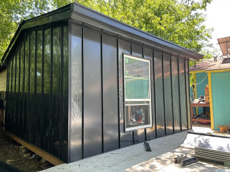 Black standing seam metal wall panels for Roof Inspection in Westmont